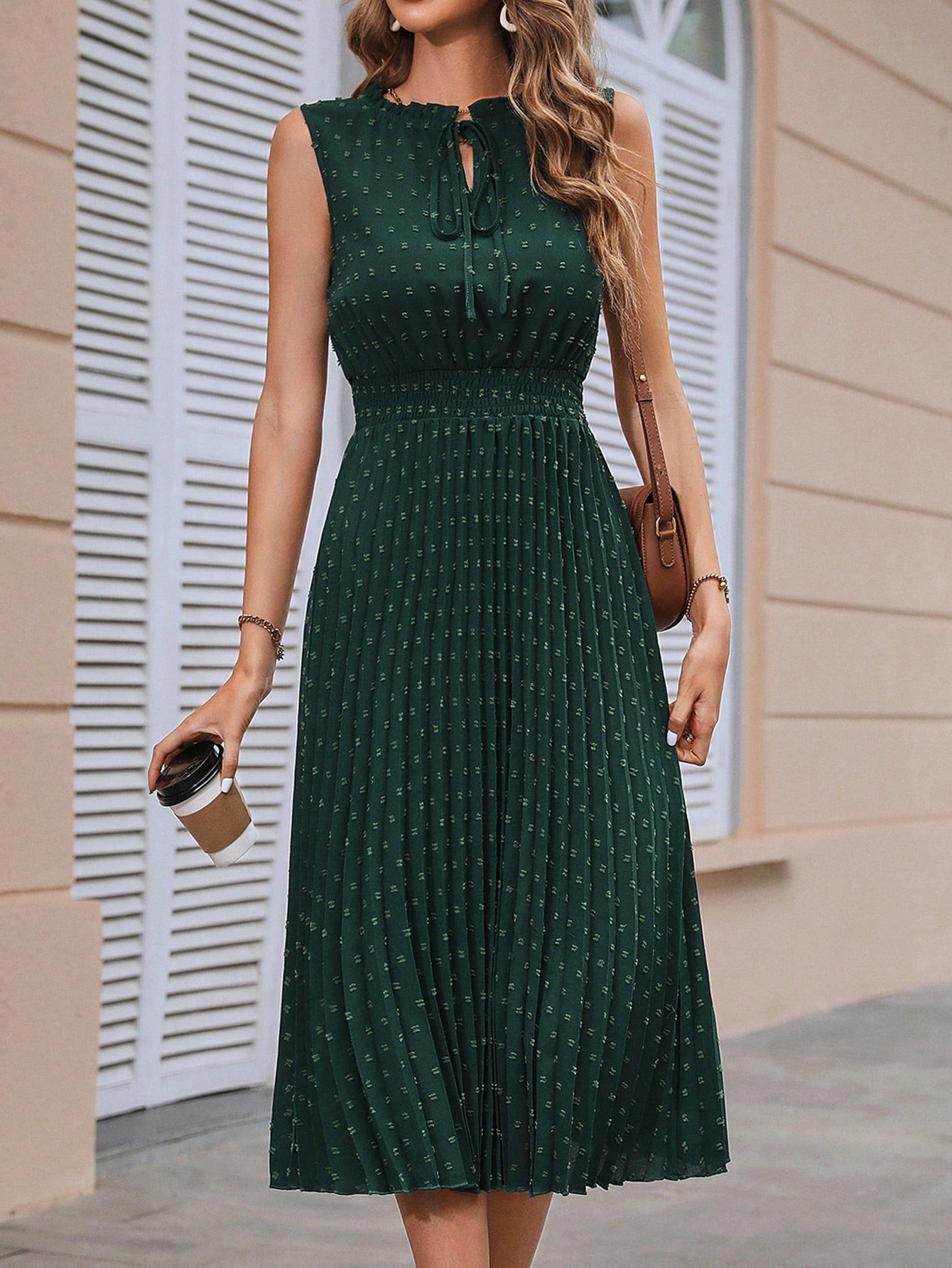Effortlessly achieve elegance in this Chic Tie-Neck Pleated Maxi Dress. The tie-neck adds a touch of sophistication, while the pleats provide a flattering silhouette. Perfect for any occasion, this dress will have you looking chic and poised (with minimal effort).