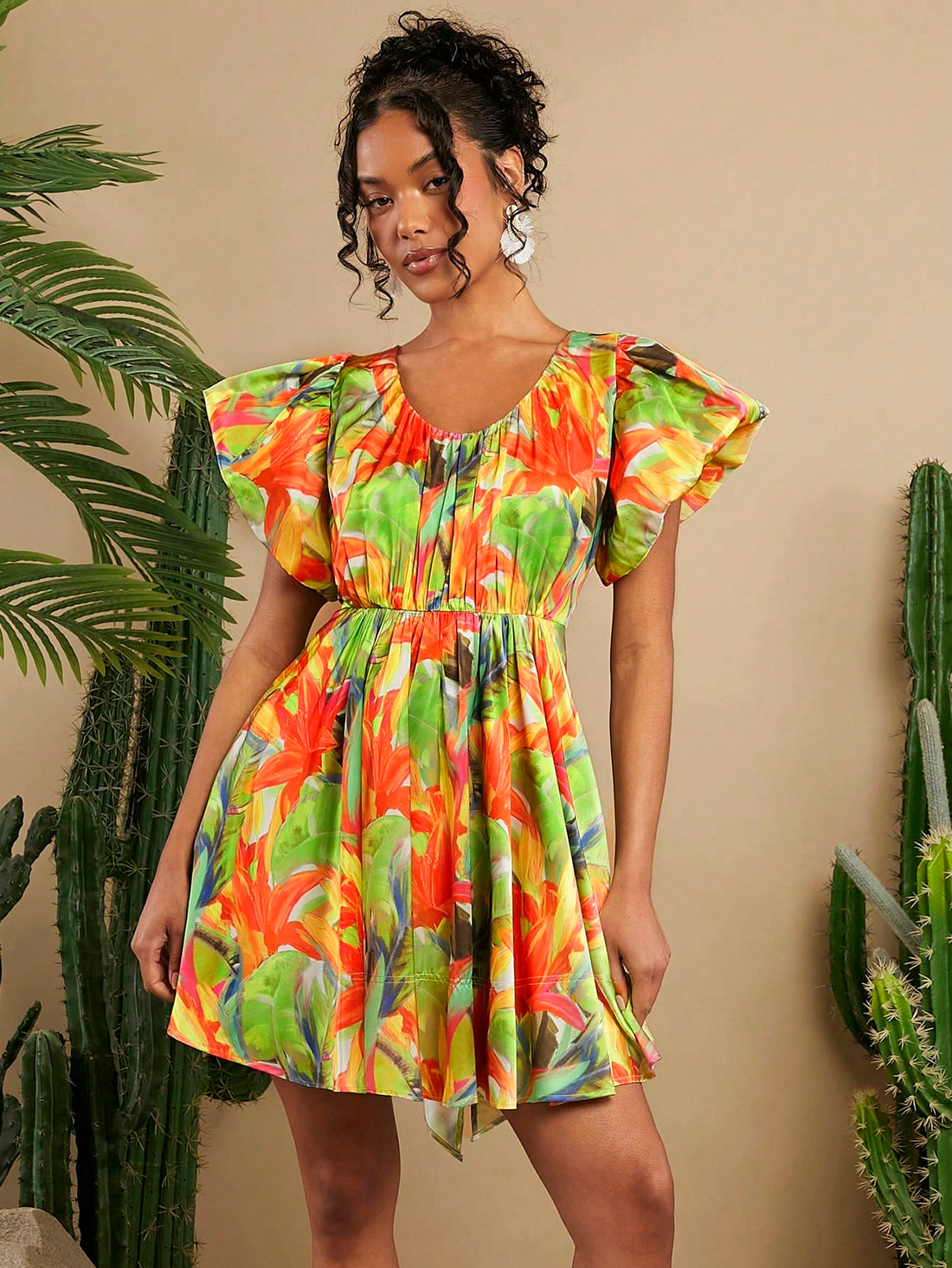 Step into sunshine with this Chic Tropical Flower Ruffle Hem Mini Dress! Its vibrant floral print and flirty ruffle hem bring playful charm to your summer wardrobe. Lightweight and breezy, it’s perfect for beach days, garden parties, or casual strolls. Effortless style meets fun flair in this must-have dress that keeps you cool and radiant all season long.