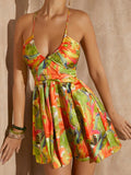 Step into sunshine with this Chic Tropical Print Lace-Up Back Cami Dress, perfect for breezy spring and summer days. Its playful tropical pattern and flirty lace-up back add a fun twist to your warm-weather wardrobe, keeping you cool and stylish wherever you go. Easy to dress up or down, this dress brings effortless charm to every sunny adventure.