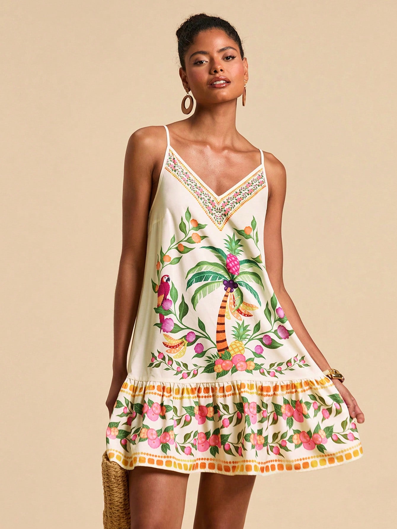 Embrace sunny vibes with this chic tropical print slip dress, designed to keep you cool and stylish all summer long. Its lightweight fabric and flattering cut make it ideal for beach days or dancing at festivals. Effortlessly playful and breezy, this dress is your go-to for warm-weather fun.
