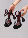 Black rhinestone crisscross platform sandal view 1 with open toe and ankle strap