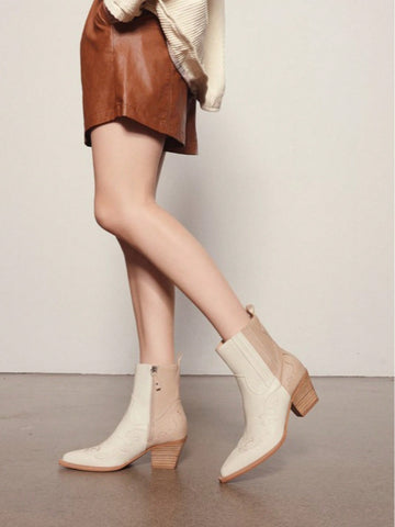 Step out in style with these Chic Two-Tone Western Ankle Boots! Perfect for adding a playful twist to your wardrobe, their eye-catching design blends classic western flair with modern charm. Comfortable and versatile, these boots are ready to accompany you on any adventure, turning heads wherever you go. Embrace your inner trendsetter and let your feet do the talking!
