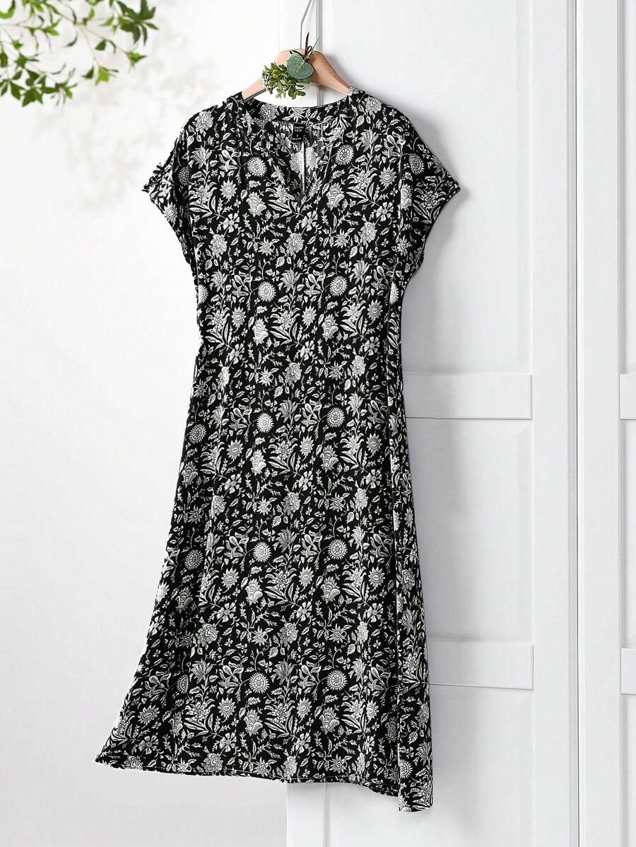 Experience the perfect blend of chic and playful in our V-neck floral print midi dress for women. With its vibrant floral pattern, this dress is the perfect choice for spring and summer events. The v-neckline adds a dash of elegance while the midi length keeps it modern. Get ready to turn heads and embrace the sunny season in style!