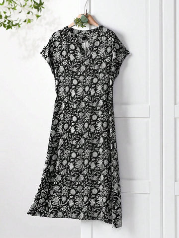 Experience the perfect blend of chic and playful in our V-neck floral print midi dress for women. With its vibrant floral pattern, this dress is the perfect choice for spring and summer events. The v-neckline adds a dash of elegance while the midi length keeps it modern. Get ready to turn heads and embrace the sunny season in style!