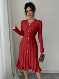 This stylish sweater dress will keep you warm and fashionable. The V-neck and ribbed knit add texture and the button detail adds a touch of elegance. Made with high-quality materials for a comfortable fit. Perfect for any occasion.