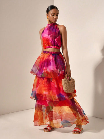 Spread the love this Valentine's Day in this show-stopping tie-dye set! The halter top features a flattering neckline and vibrant color-blocked design, while the ruffled skirt adds playful movement and dimension. Perfect for date night, galentine's celebrations, or whenever you want to turn heads. Mix bold patterns with confidence and let your personality shine through. Whether you're dancing the night away or grabbing coffee with your crew, this trendy two-piece combo keeps you looking effortlessly chic an