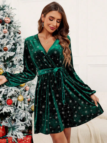 This elegant velvet dress features a unique snowflake print and statement lantern sleeves. Complete the look with the included belt for a chic and sophisticated ensemble. Stay stylish and warm this winter season.