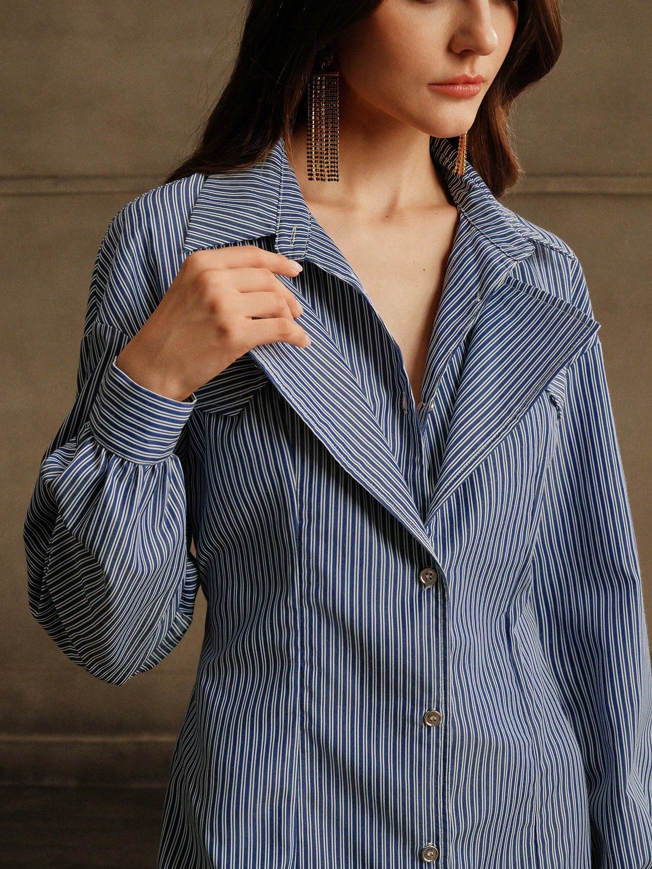 Introducing the Chic & Versatile 2-in-1 Striped Shirt Dress! Achieve Autumn elegance with this unique and fashionable piece. Perfect for any occasion, this dress seamlessly combines a classic shirt design with a stylish striped pattern. Dress to impress with this must-have addition to your wardrobe.