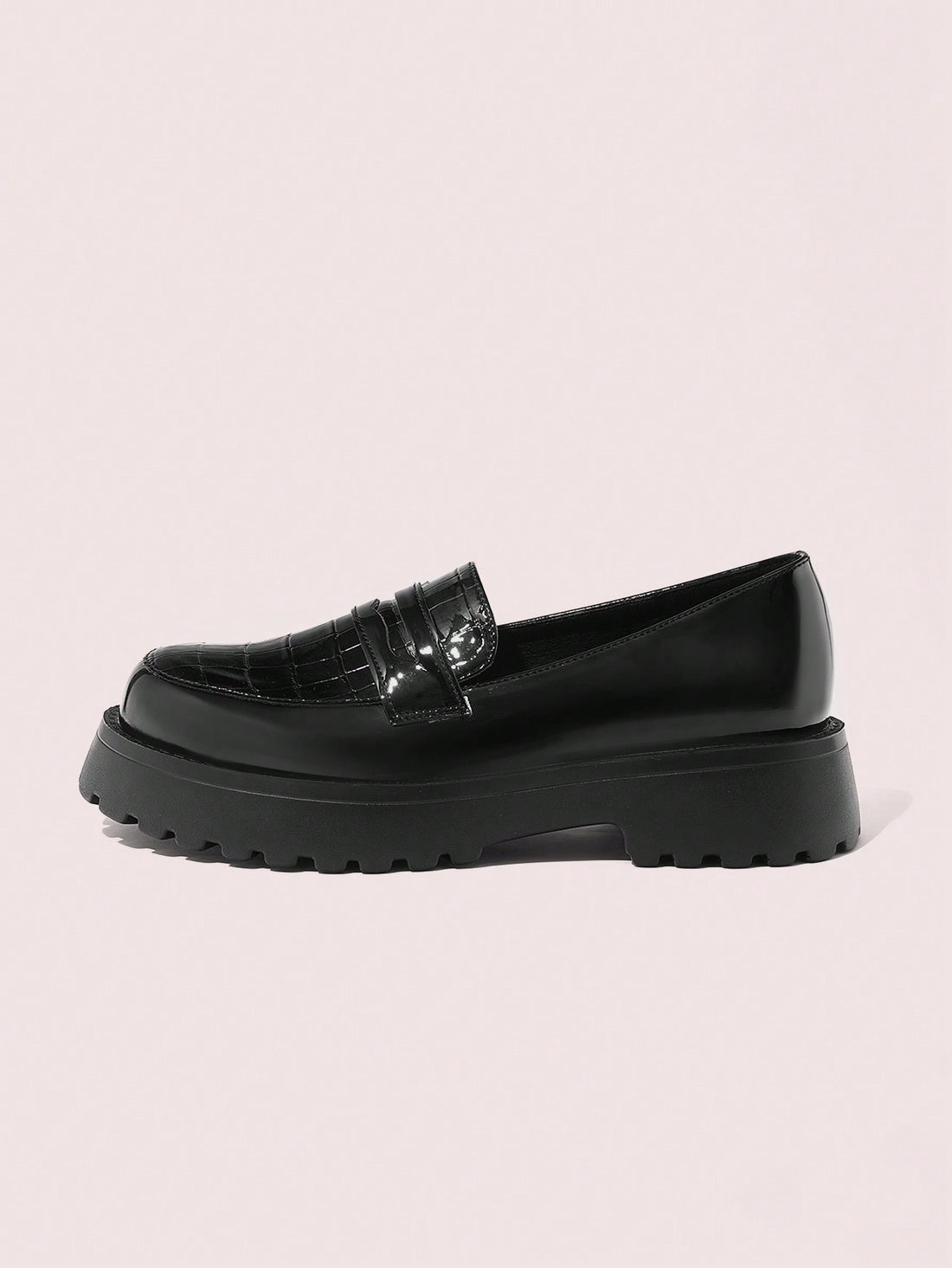 Experience effortless style with these chic and versatile black slip-on platform shoes. These shoes are perfect for any occasion, whether you're dressing up or keeping it casual. Their sleek design and comfortable platform make them a must-have addition to your wardrobe. Elevate your fashion game with these stylish shoes!