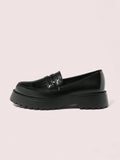 Experience effortless style with these chic and versatile black slip-on platform shoes. These shoes are perfect for any occasion, whether you're dressing up or keeping it casual. Their sleek design and comfortable platform make them a must-have addition to your wardrobe. Elevate your fashion game with these stylish shoes!