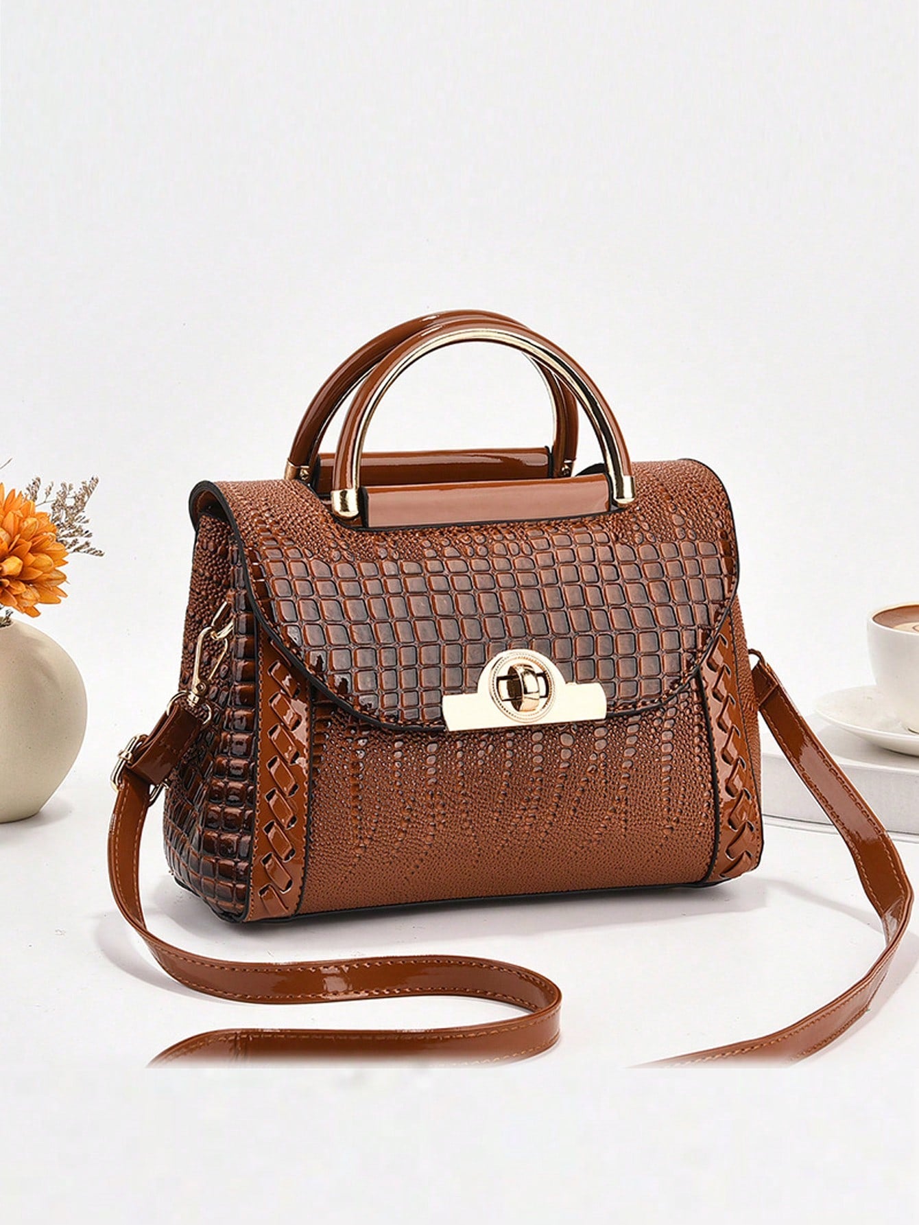 This small crossbody bag for women combines chic and versatility in a trendy design, making it effortless to elevate your style. The exquisite craftsmanship and compact size make it a perfect choice for any occasion. Stay fashionable and organized with this must-have accessory.