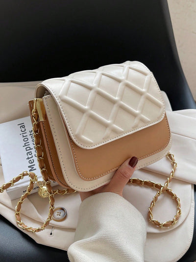 This chic and versatile mini colorblock quilted chain flap bag is the perfect accessory for both business and casual looks. With its sleek design and quilted texture, it adds a touch of elegance to any outfit. The adjustable chain strap allows for easy transition from day to night.