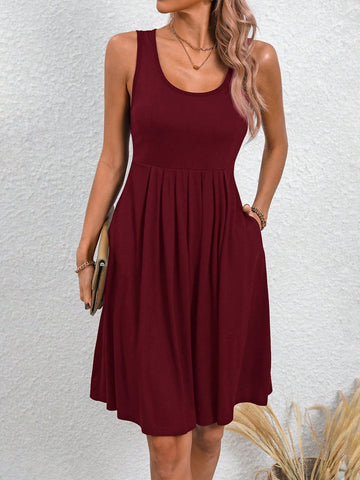 Stay stylish and comfortable in our Chic & Versatile Solid Color Dress with Pockets. Perfect for any occasion, this sleeveless dress features convenient pockets and a timeless solid color design. A must-have addition to your wardrobe!