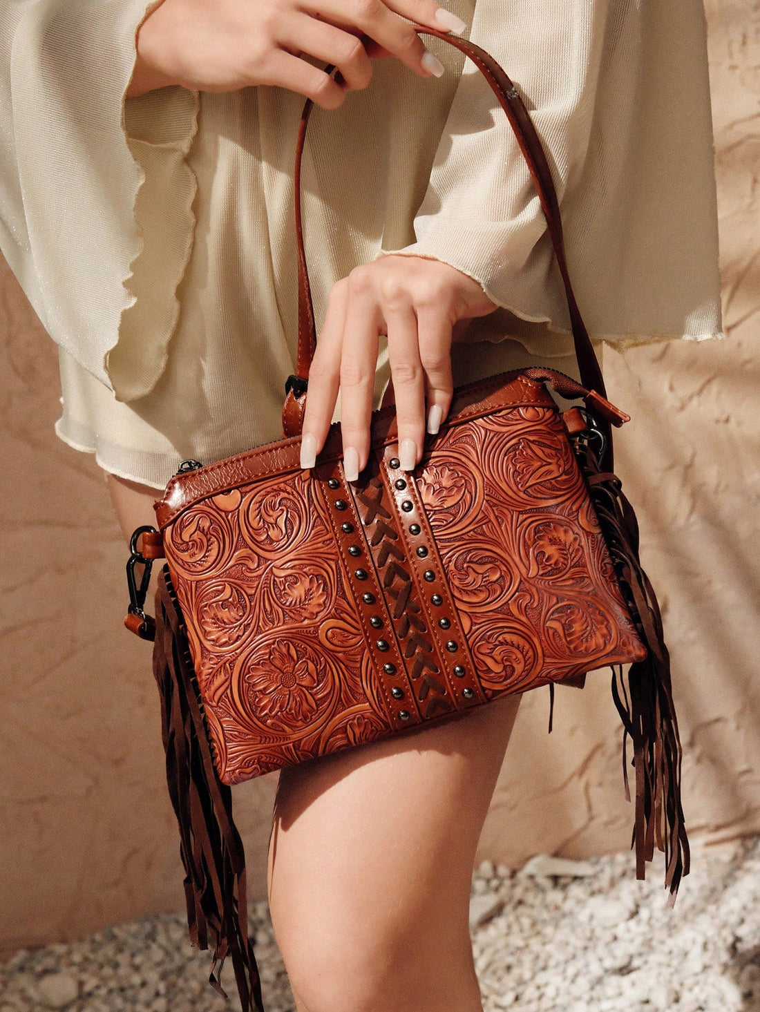 Get ready to turn heads with this charming Chic Vintage-Inspired Tassel Clutch Crossbody Bag! A fusion of vintage and modern styles, this bag features a trendy tassel for a touch of playfulness. With its versatile design, you can wear it as a clutch or crossbody for any occasion. Style meets functionality in this must-have accessory!