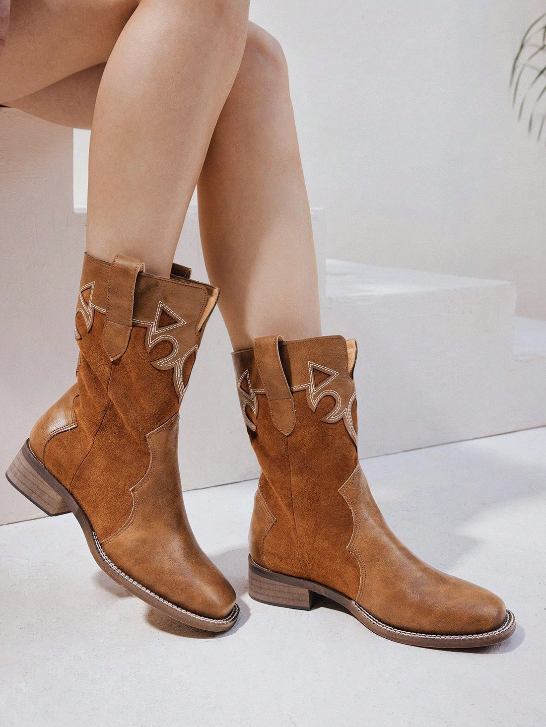 Unleash your inner fashionista this fall with our Chic Vintage-Inspired Western Boots! From the runway to the streets, these boots add a touch of vintage charm to any outfit. Step into style and comfort with these trendy boots. Elevate your fall wardrobe now!