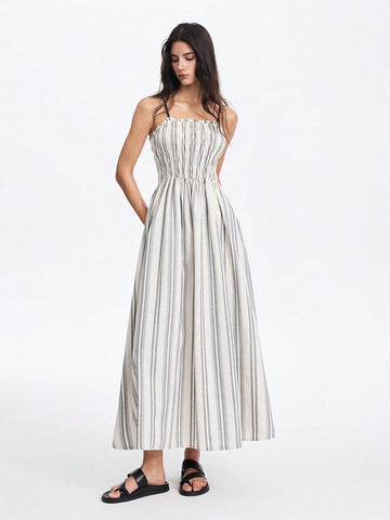 Step into sunny days with this Chic Vintage A-Line Maxi Dress, designed for effortless style and comfort. Its breezy striped linen fabric keeps you cool, while the flattering A-line cut adds a touch of retro charm. Perfect for spring and summer getaways, this dress pairs beautifully with sandals and a sunhat for a playful, vacation-ready look.
