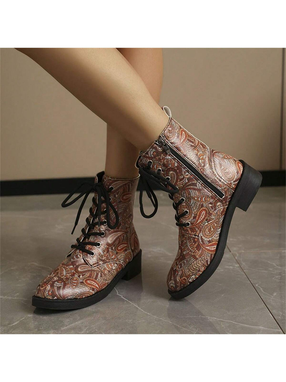 Experience style and stability with our Chic Vintage Lace-Up Short Boots. The contrast color block provides a unique touch while the slip-resistant thick heels ensure safe and comfortable wear all day. Elevate your fashion game with these lace-up boots.