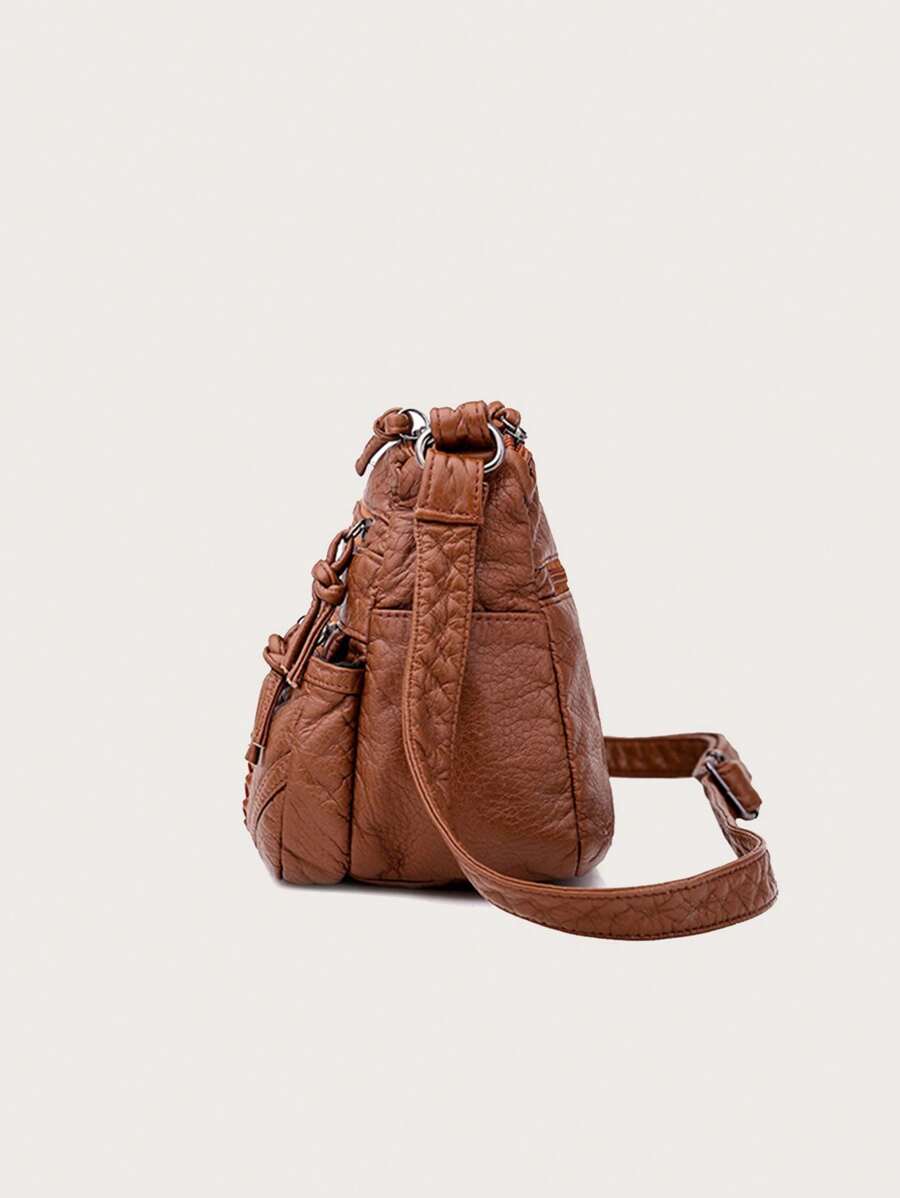 Add a dash of vintage charm to your everyday look with this Chic Vintage PU Leather Shoulder Bag. Perfectly sized for all your essentials, it switches effortlessly between messenger and crossbody styles to match your mood. Soft yet durable PU leather ensures comfort and long-lasting wear, making it your new go-to companion for city strolls or weekend adventures. Carry a little nostalgia with a modern twist!