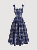 Get ready to rock that vintage look with our Chic Vintage Plaid Mid-Length Slip Dress! Perfect for Fall and Halloween, this dress is a must-have! With its sleek design and plaid pattern, you'll be the talk of the town. Get ready to turn heads with this dress!