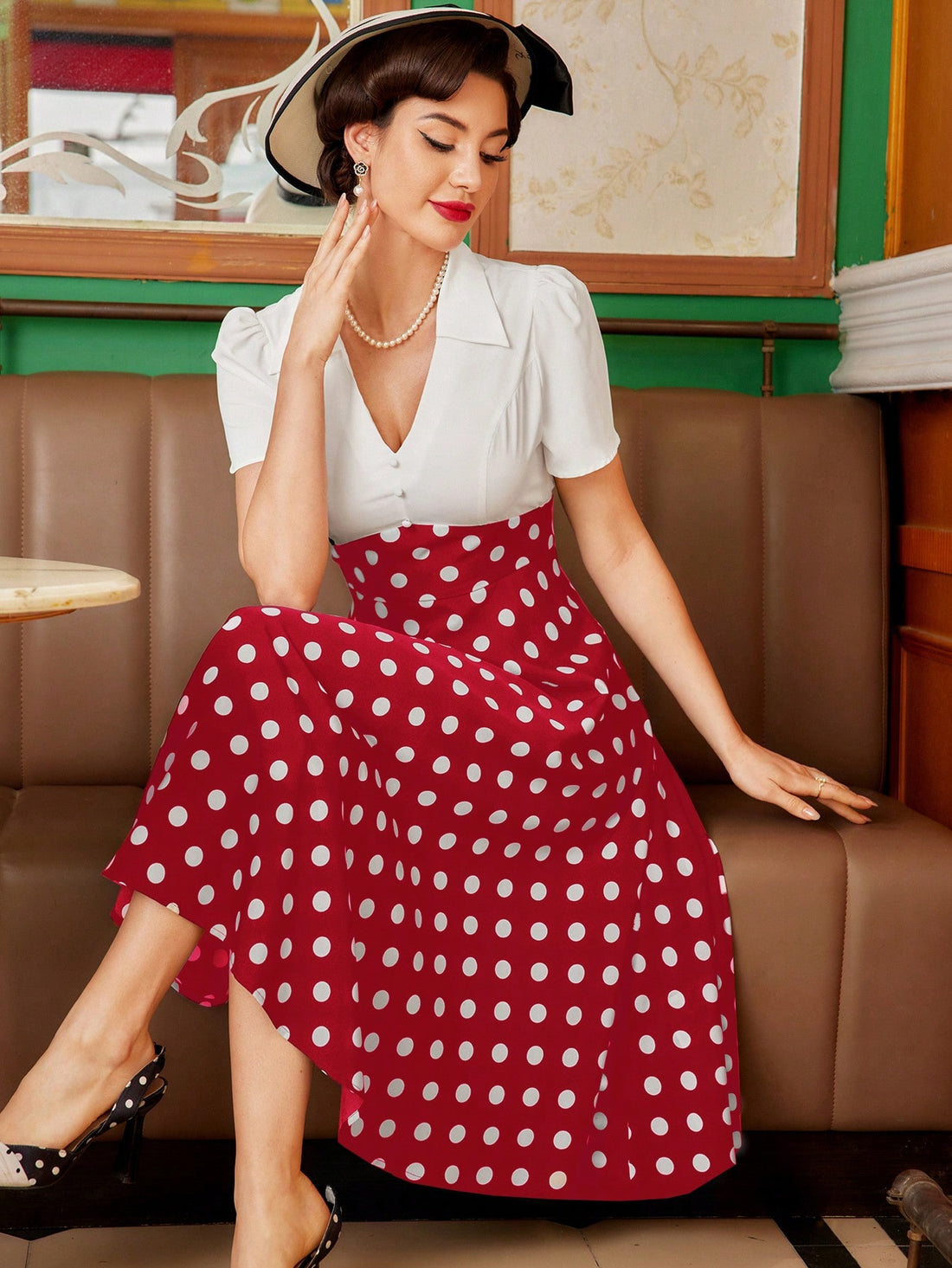 Dress to impress in our Chic Vintage Polka Dot Swing Dress. Featuring an elegant black and white design with a V-neck and collar, this dress effortlessly combines vintage charm with summer sophistication. Perfect for any occasion, this dress will elevate your style with ease.