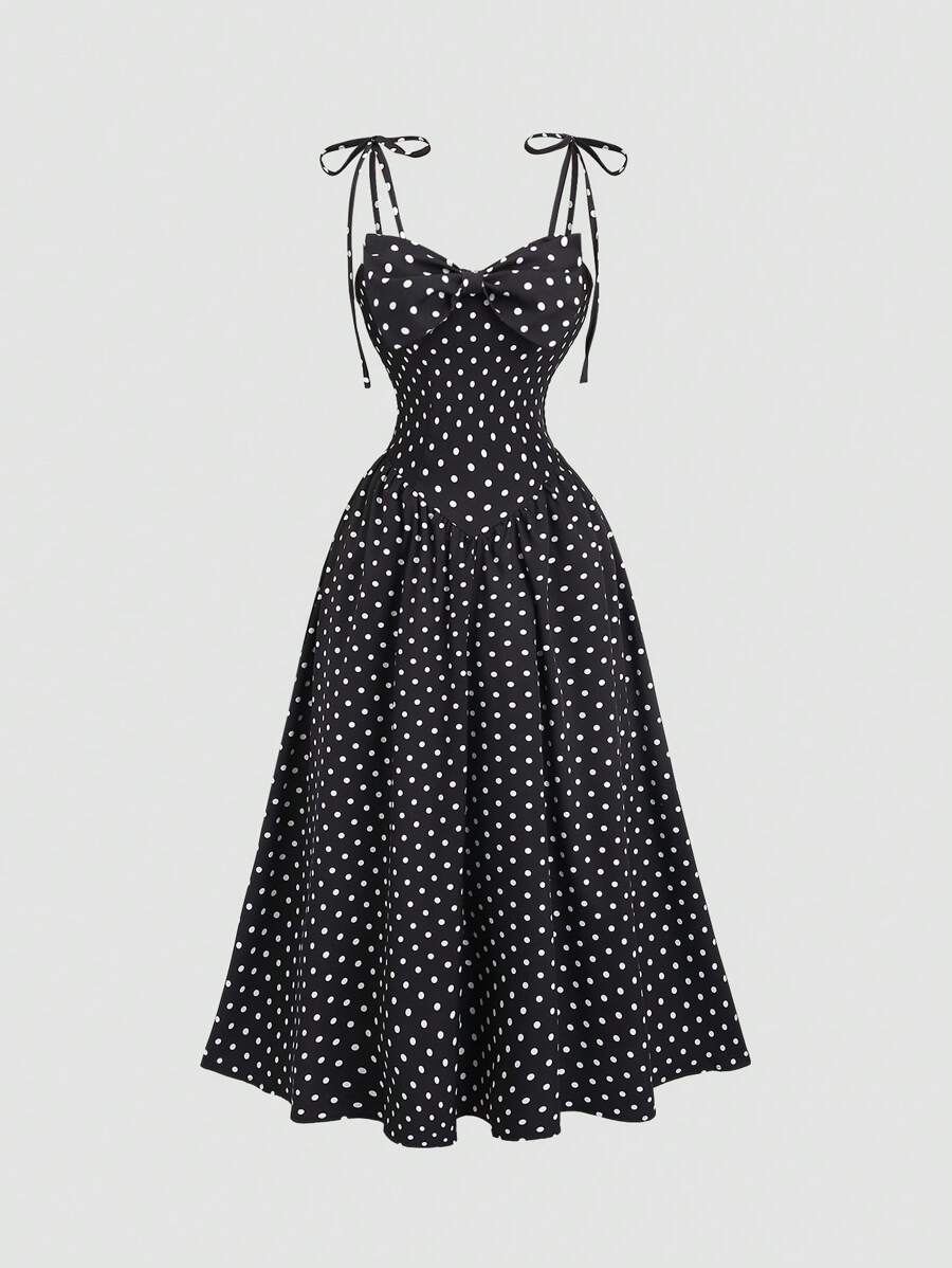 Step into summer with this playful vintage-inspired maxi dress. Featuring a vibrant red polka dot pattern and delicate floral accents, its backless design and charming bow add a flirty touch. Lightweight and breezy, it’s perfect for sunny days and warm evenings, combining classic style with a fun, modern twist.