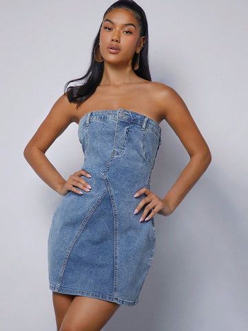 Effortlessly elevate your style with our Chic Washed Denim Strapless Dress. Whether it's a day out with friends or a special occasion, this dress offers a versatile and stylish option. Made with high-quality denim, it combines comfort and fashion effortlessly. Upgrade your wardrobe with this must-have piece.