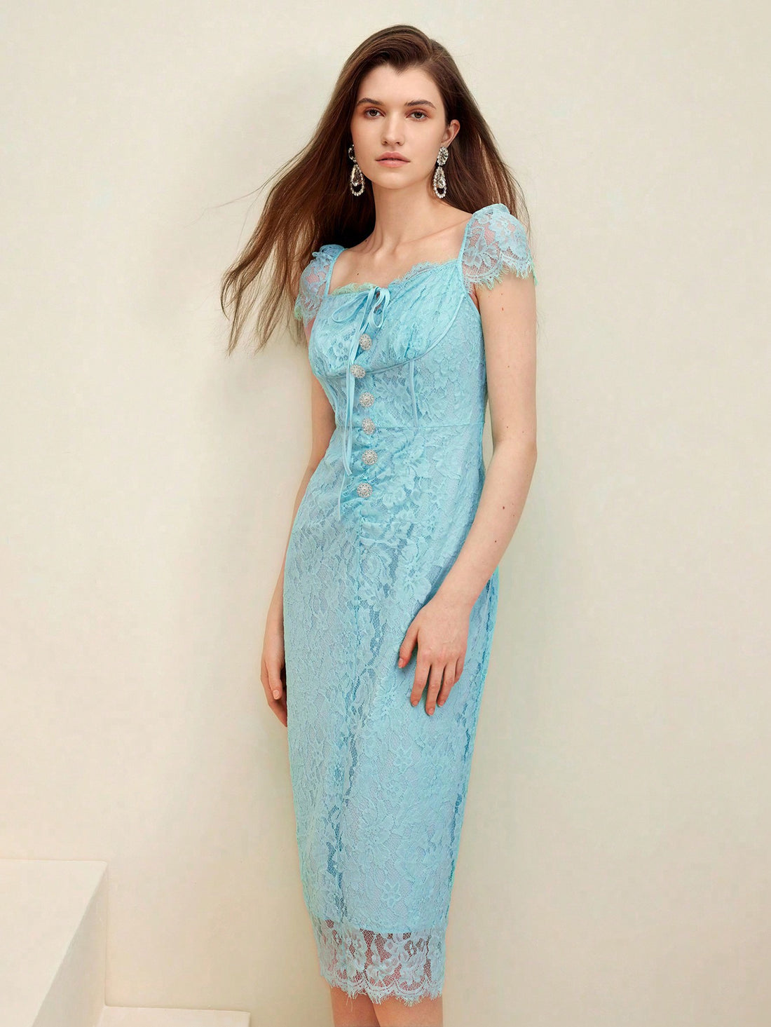 <div class="_TextOutput_nect0_1"><div class="_HtmlText_nect0_37 _Vertical_nect0_21">Get ready to turn heads with our Chic Water Blue Lace Midi Dress - Effortless Elegance for Any Occasion. The elegant lace design and midi length make it perfect for any event. Just slip it on and effortlessly stand out in style.</div></div>