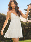 Turn heads in this flirty Western-inspired babydoll mini dress that perfectly blends cowgirl charm with modern sass. The plunging V-neckline and delicate crochet lace detailing create an effortlessly chic silhouette, while adorable bow tie accents add a playful touch. Lightweight and flattering, this dress is your go-to for making a statement at any occasion—whether you're hitting the dance floor or stealing the spotlight at your next event.