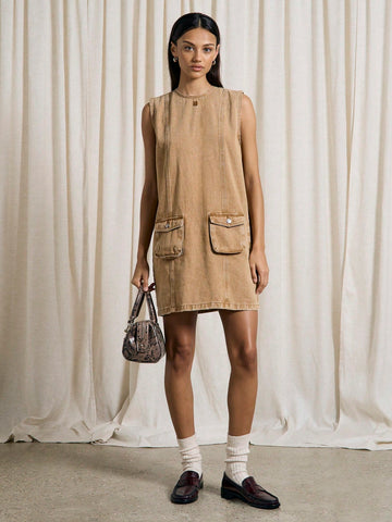 Step into effortless cool with this Chic Western Washed Denim Cargo Penny Dress. Featuring handy pocket details and a relaxed fit, it’s perfect for adding a playful, laid-back vibe to your wardrobe. Whether you’re out exploring or meeting friends, this dress combines comfort and style with a touch of Western charm.