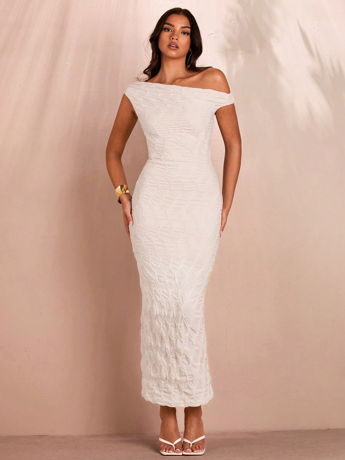 Get ready to turn heads at your next summer party with our Chic White Asymmetrical Knit Dress! This dress is perfect for the fashion-forward woman who wants to make a statement. The asymmetrical design adds a touch of uniqueness, while the lightweight knit material will keep you cool and comfortable all night long. Perfect for any summer occasion, this dress will have you feeling chic and confident!