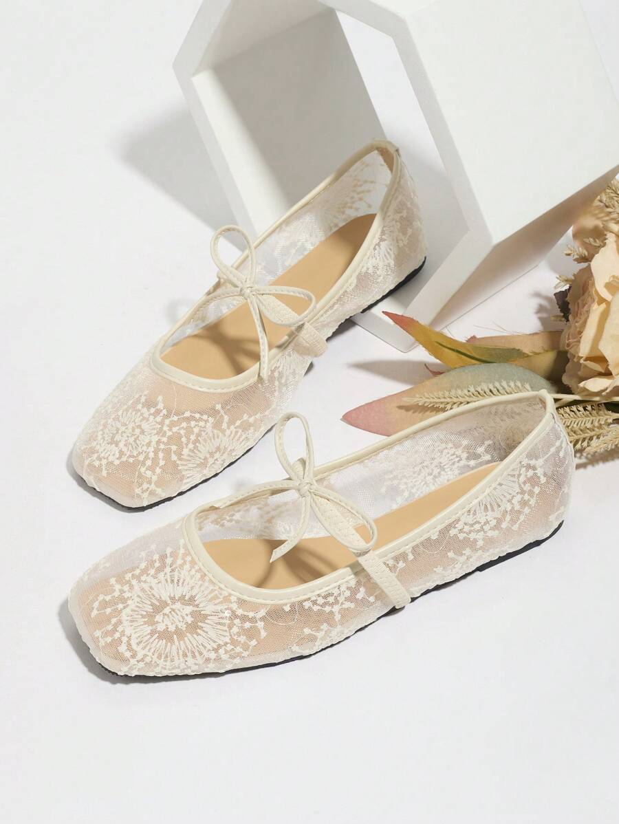 Step into summer with these chic white ballet flats, featuring a playful bow and delicate floral embroidery. Crafted with breathable mesh, they keep your feet cool and comfy all day long. Perfect as Mary Jane sandals, they add a touch of whimsy and charm to any outfit, making every step feel light and fun.