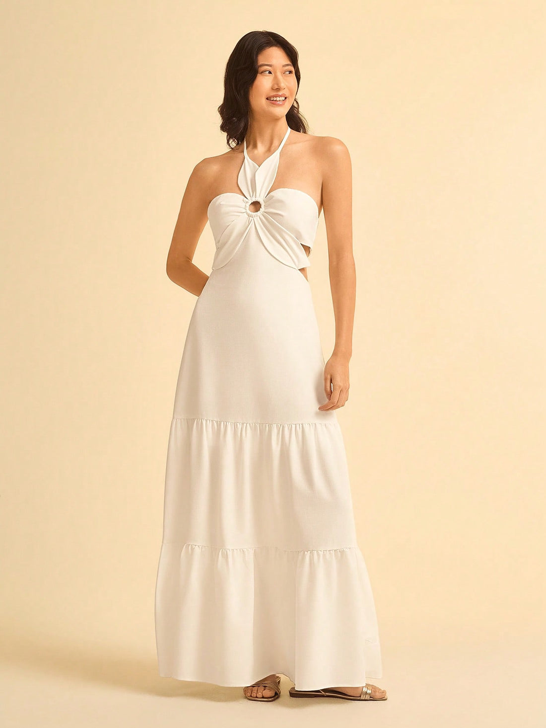 Step into sunshine with this Chic White Lace-Up Floral Cutout A-Line Dress, perfect for summer beach trips and flirty date nights. The playful lace-up detail and delicate floral cutouts add a breezy charm, while the flattering A-line silhouette keeps you comfortable and stylish all day long. Whether you’re strolling the shore or charming your special someone, this dress is your go-to summer companion.