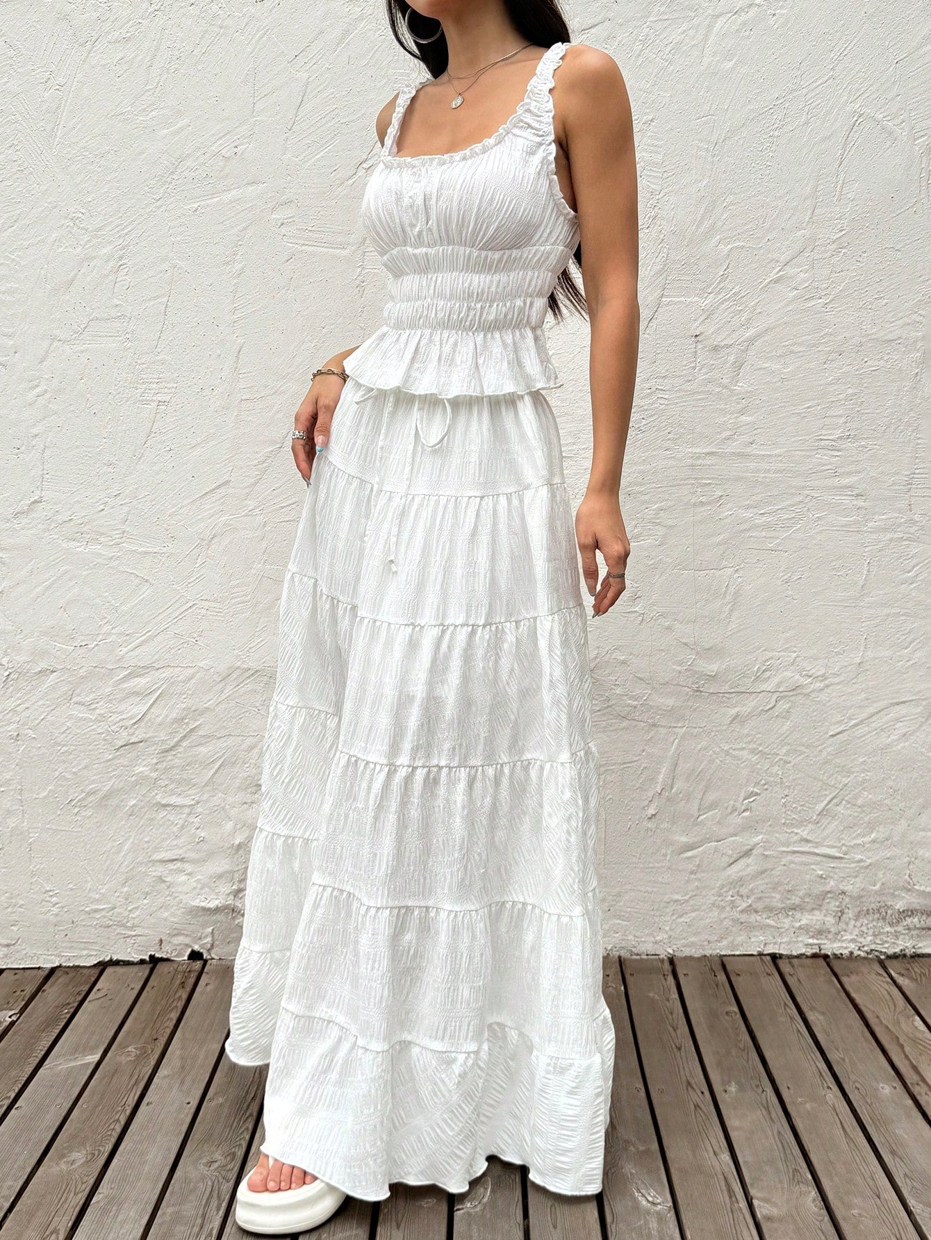 Elevate your everyday style with this effortlessly chic white two-piece outfit! Designed for the modern woman who loves versatility, this set pairs a crisp, tailored top with perfectly coordinated bottoms for a polished look that works from morning coffee runs to casual lunch dates. The clean white palette keeps things fresh and timeless, while the two-piece design lets you mix and match with your existing wardrobe. Whether you're dressing up with accessories or keeping it laid-back, this outfit is your new