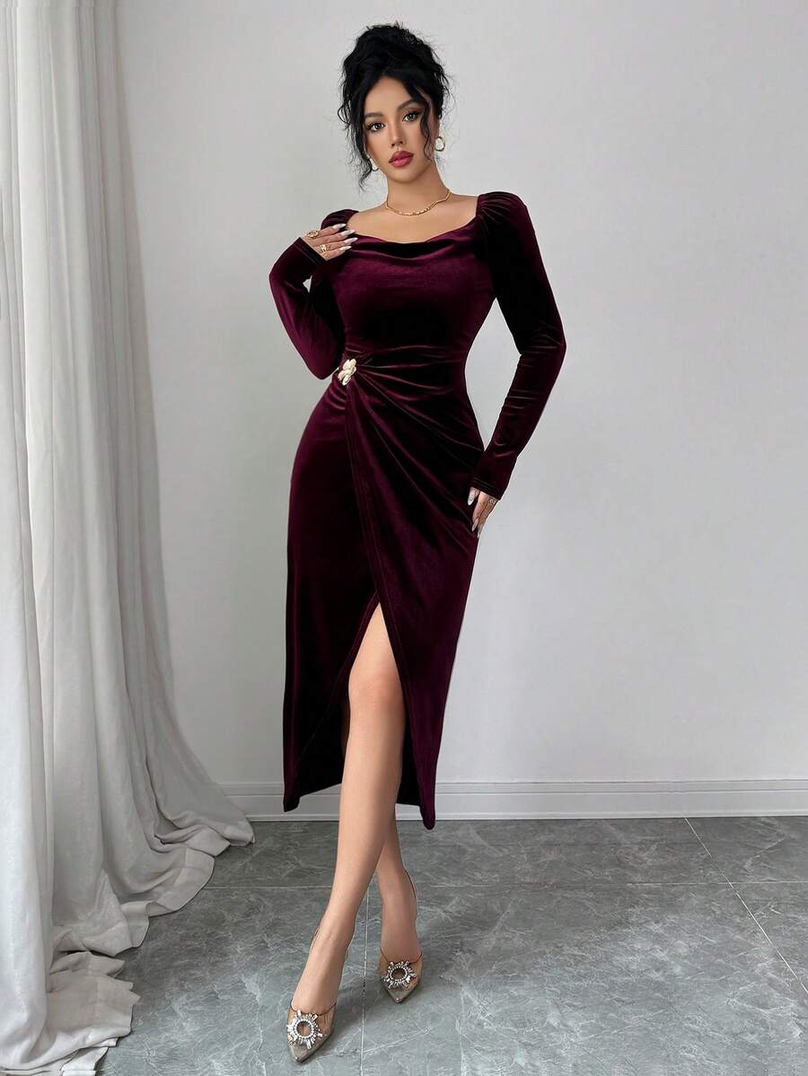 Experience the breathtaking fusion of heritage luxury and sharp, modern architectural tailoring. This stunning velvet wrap ensemble is meticulously designed for the woman who values a high-fashion, "quiet luxury" approach to seasonal dressing—the ultimate centerpiece for prestigious winter retreats, exclusive holiday soirées, and high-authority evening outings.