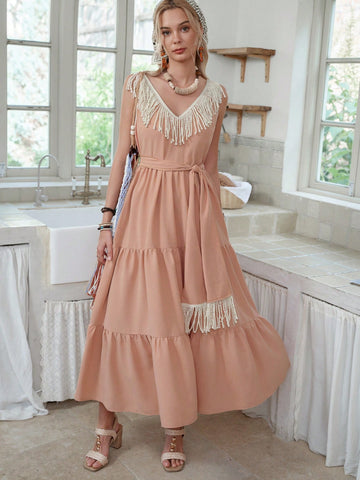 Add a splash of fun to your wardrobe with this chic A-line dress, featuring a playful fringe hem that dances with every step. Perfect for countryside escapes or casual days out, its relaxed fit keeps you comfy while turning heads. Embrace effortless style and let your dress do the talking wherever you go!