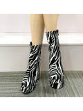 These chic ankle boots feature a stylish side zipper and are perfect for any occasion. Slip them on and elevate your style game with a touch of flair. Ditch the boring old boots and step into these trendy must-haves!