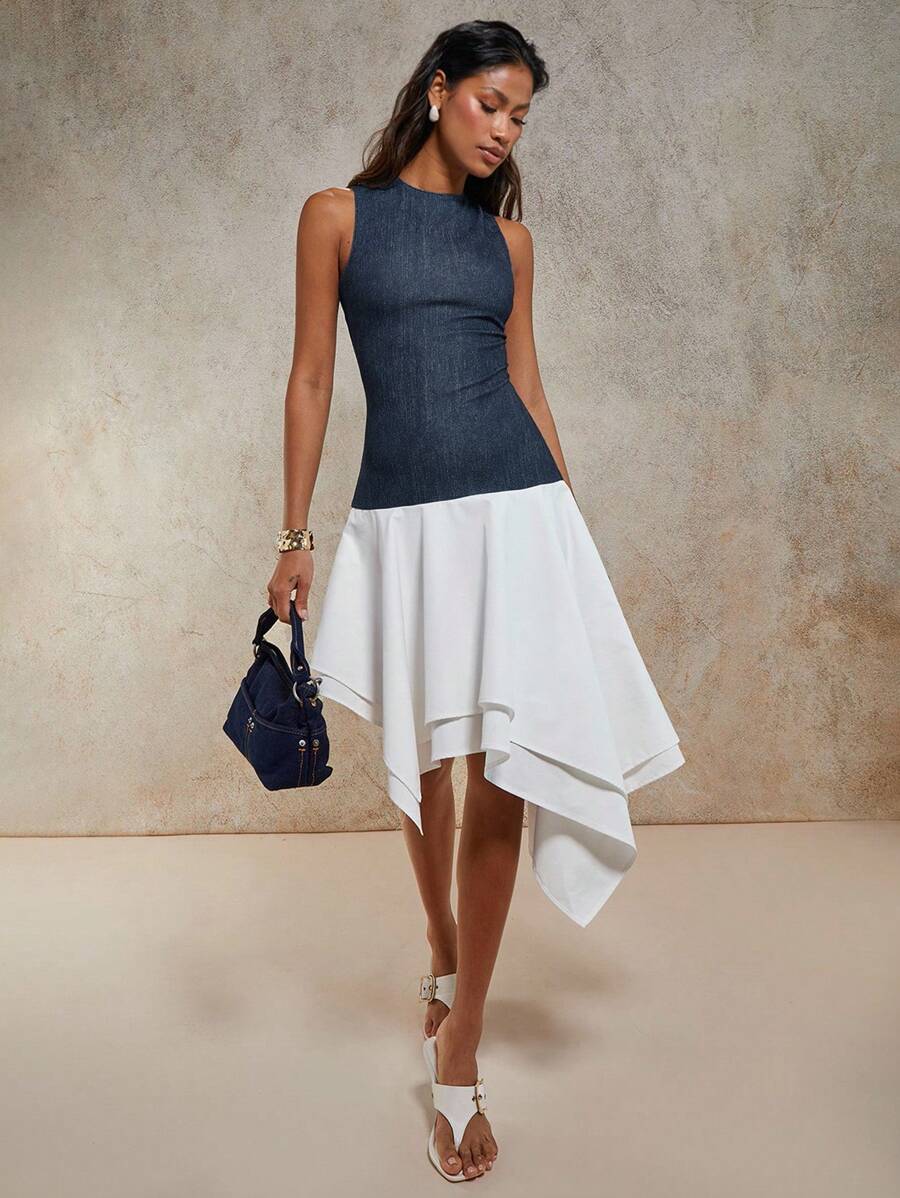 Elevate your wardrobe with this playful sleeveless dress that's anything but ordinary. The asymmetric hem creates an effortlessly chic silhouette, while bold contrast colors add personality and flair to your everyday look. Perfect for transitioning from brunch to evening plans, this mid-length style flatters all figures and pairs beautifully with sneakers or heels. A modern essential that proves fashion should be fun.