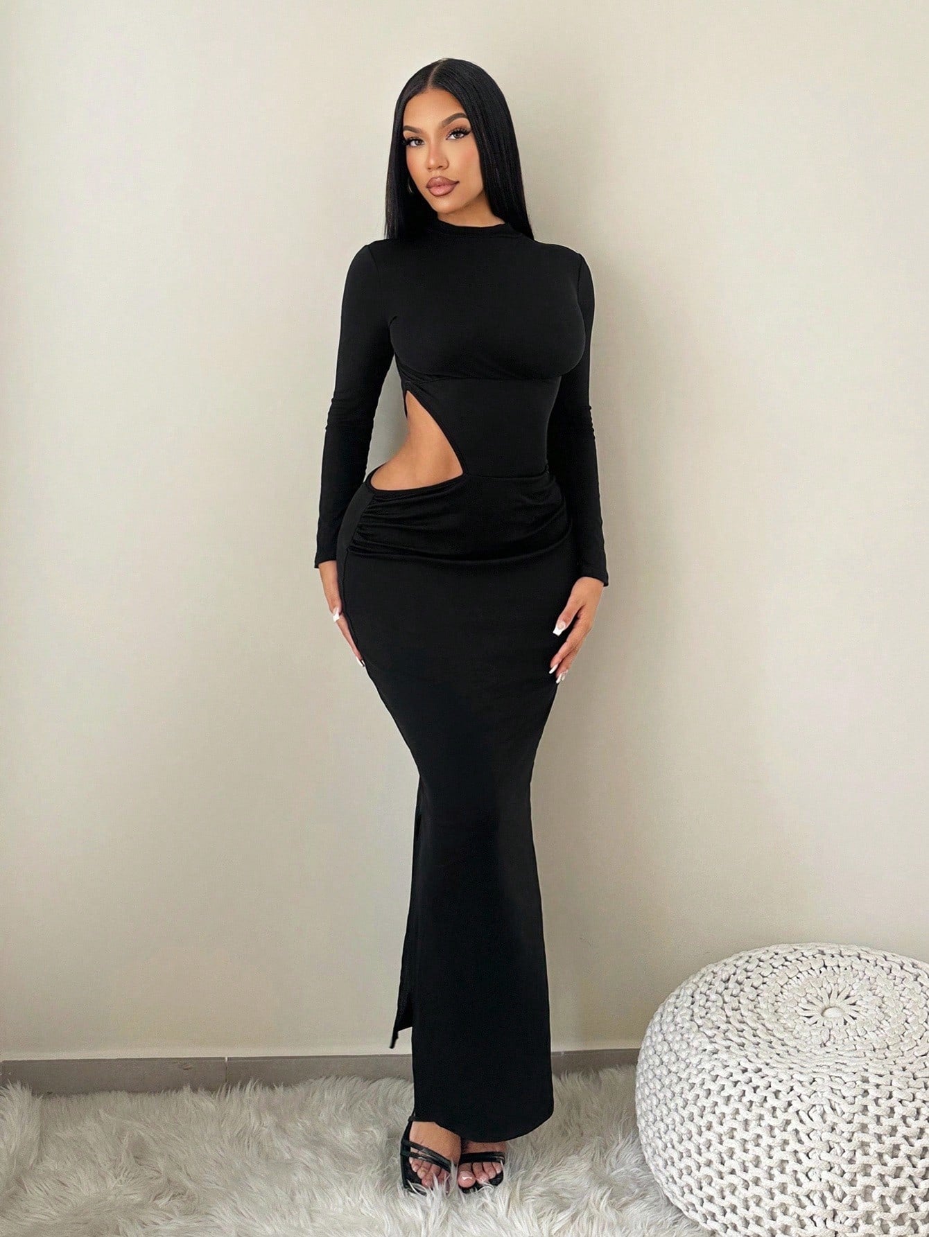 Elevate your fall wardrobe with this show-stopping dress that perfectly balances sophistication and sass. The daring waist cutout adds an unexpected flirty touch, while the thigh-high slit keeps things modern and effortless. Crafted in a rich solid color, this piece transitions seamlessly from day to night—pair it with sneakers for casual vibes or heels for a night out. It's the kind of dress that makes you feel confident, chic, and ready to turn heads.