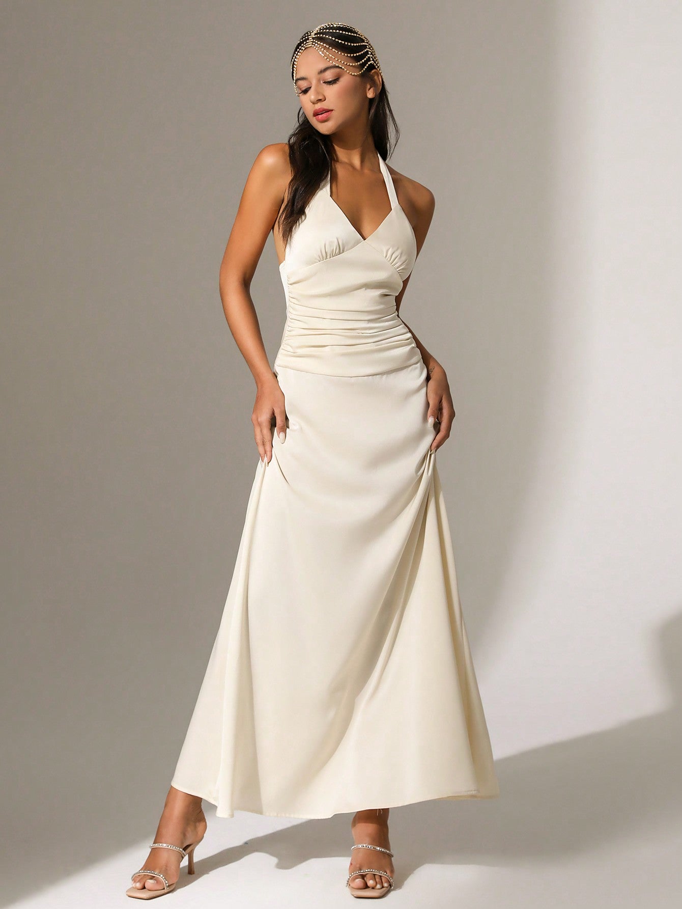 Effortlessly elegant, this backless v-neck halter dress is perfect for any chic woman. With a solid color design, this dress exudes sophistication and style. Embrace your inner fashionista with this must-have dress.