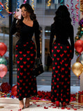 Make a statement this Valentine's Day in our stunning Black Heart Print Colorblock Maxi Dress. Featuring an eye-catching heart print paired with bold colorblocking and a flattering oblique V-neckline, this dress effortlessly transitions from romantic dinners to special celebrations. The flowing maxi silhouette offers comfort and elegance, while the playful design keeps things fun and flirty. Perfect for anyone ready to wear their heart on their sleeve—literally!