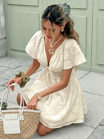 Step into summer with this playful ruffle hem mini dress, designed to bring effortless boho charm to your casual wardrobe. Light and breezy, it’s perfect for sunny days and spontaneous adventures. The flirty ruffles add a fun twist, making it your go-to dress for warm-weather fun and easy style.