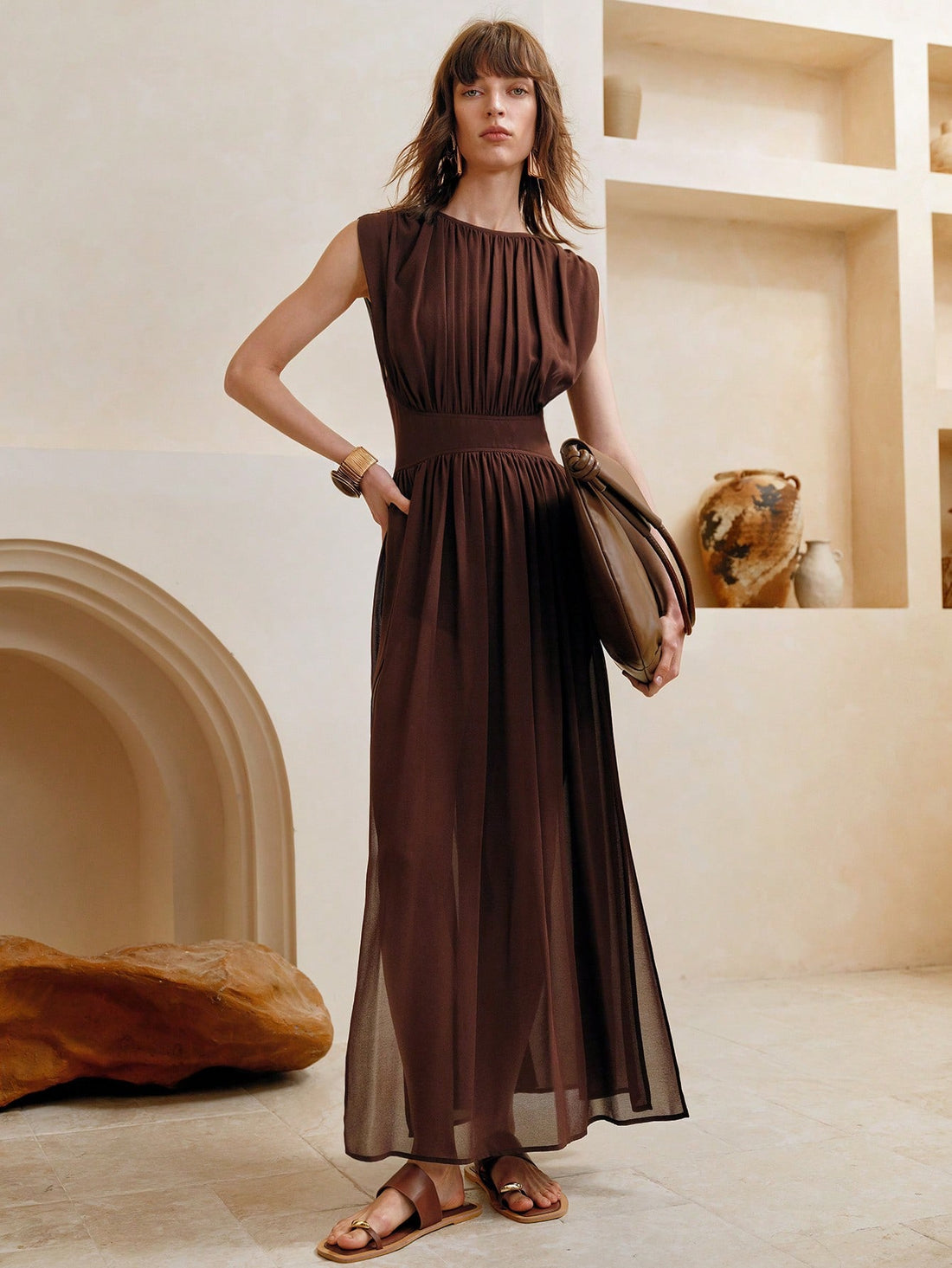 Float through your summer days in this chic chiffon maxi dress. Its loose, sleeveless design keeps you cool and comfy, making it ideal for casual vacations or sunny outings. Effortlessly stylish and breezy, it’s your go-to for easy, playful elegance wherever you wander.