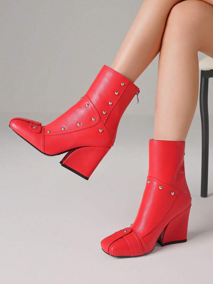 Step into fall with these chic women's ankle booties, featuring a trendy chunky heel and a stylish square toe. The convenient back zipper makes slipping them on a breeze, while their bold design adds a playful edge to any outfit. Perfect for turning heads and staying comfy all season long!