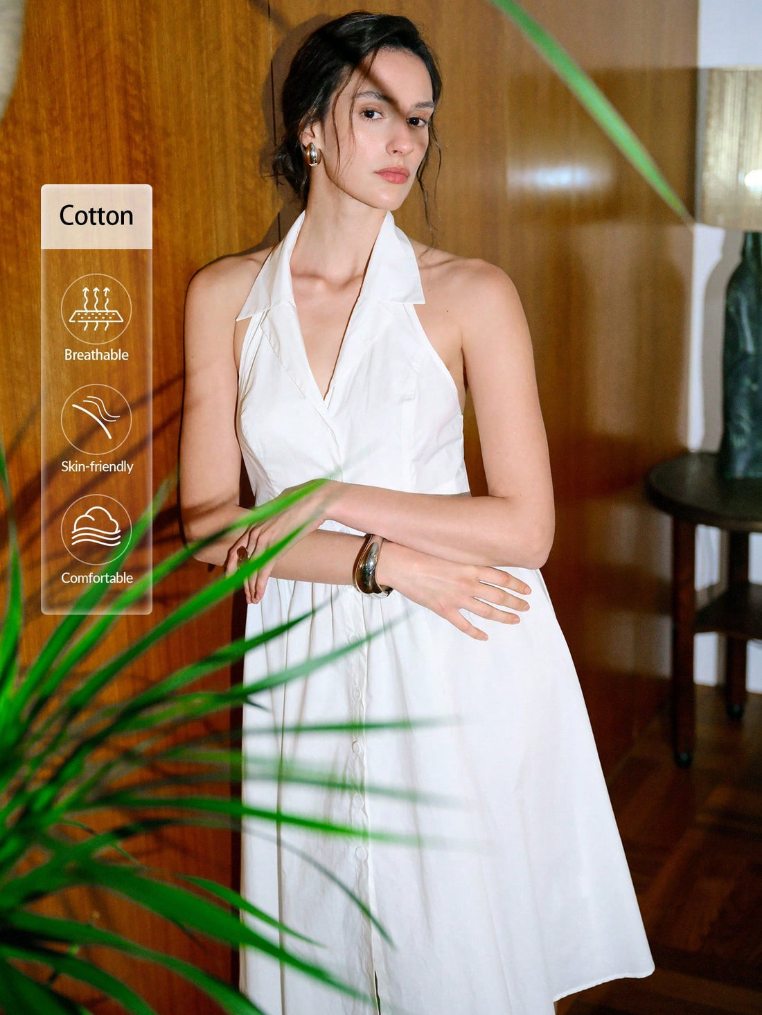 Step up your fashion game with our Chic Women's Collared Button Front Backless Dress. This stylish mid-length dress is a must-have essential that will make heads turn. The collared button front adds a touch of sophistication while the backless design adds a flirty twist. Don't miss out on this fashion-forward piece!