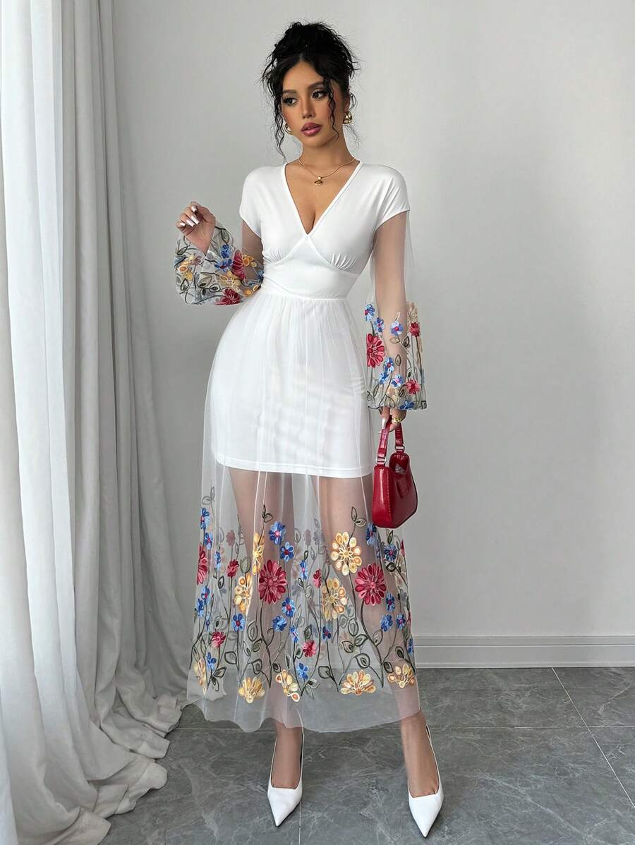Step out in style with this playful embroidered mesh maxi dress featuring a flattering V-neck and charming lantern sleeves. Its flowing A-line silhouette moves beautifully through spring and autumn days, blending comfort with whimsical elegance. Perfect for those who want to feel effortlessly chic and ready for any occasion.