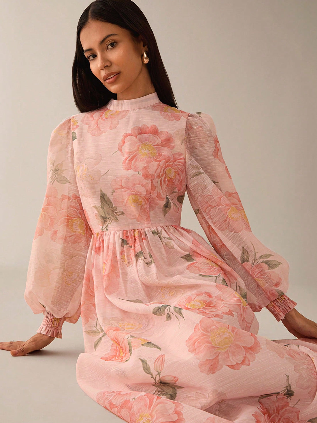 Step out in style with this chic women's floral print dress, designed to keep you cool and breezy all spring and summer. Its sheer, lightweight fabric dances with every move, making it perfect for sunny days and evening strolls. The vibrant floral pattern adds a splash of fun and femininity, turning heads wherever you go. Whether you're off to a picnic or brunch, this dress effortlessly blends comfort with playful charm.