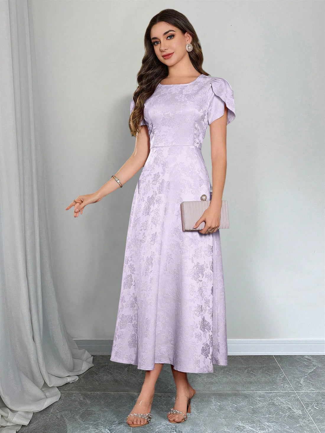 Elevate your wardrobe with this playful jacquard puff sleeve dress that's ready to make a statement! The eye-catching texture and dramatic sleeves create a silhouette that's both fun and flattering. With its versatile crew neck and floor-sweeping length, this dress transitions effortlessly from daytime adventures to evening escapades. Who said elegance can't be playful?