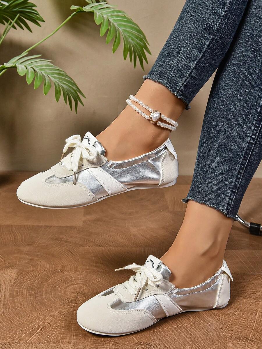 Step into timeless elegance with these charming lace-up ballet flats. Designed with a soft, flexible bottom that moves with your feet, they deliver all-day comfort without compromise. The retro-inspired lacing detail adds a touch of vintage sophistication, while the sleek silhouette pairs effortlessly with skirts, dresses, and casual everyday outfits. Whether you're heading to the office or out for a leisurely weekend, these flats are your go-to choice for understated style that never goes out of fashion.