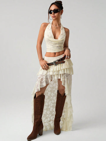 Turn heads this season with our stunning 2-piece set featuring a delicate lace halter camisole paired with a chic asymmetrical mini skirt. Perfect for summer celebrations or back-to-school vibes, this playful ensemble combines feminine elegance with modern edge. The soft lace detailing adds sophistication while the asymmetrical cut keeps things fun and flirty. Whether you're hitting a 4th of July party or making a statement on campus, this versatile set delivers style that's equal parts bold and beautiful.