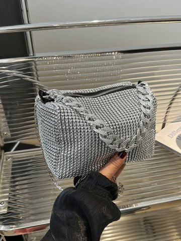 This chic crossbody bag is your new go-to for style and space! With a roomy interior, it holds all your essentials and then some. The eye-catching chain decoration adds a dash of glam, while the full drill design gives it a trendy, textured look. Perfect for playful days out or casual nights, this bag combines fun and function effortlessly.